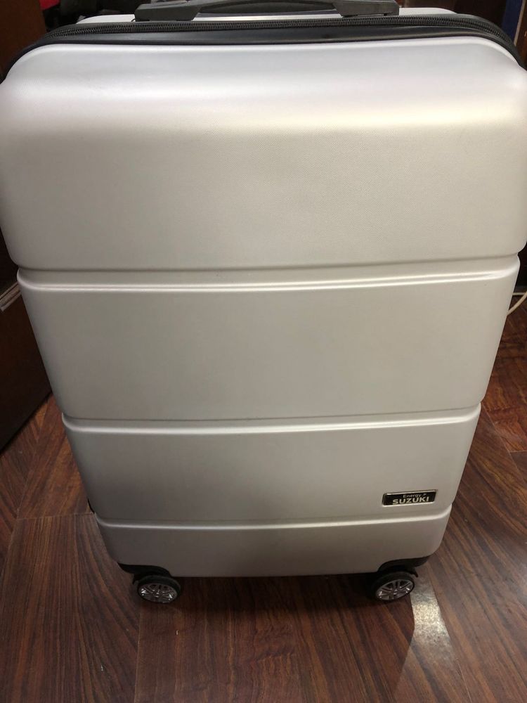 Silver Suzuki Luggage - Travel Ready!
