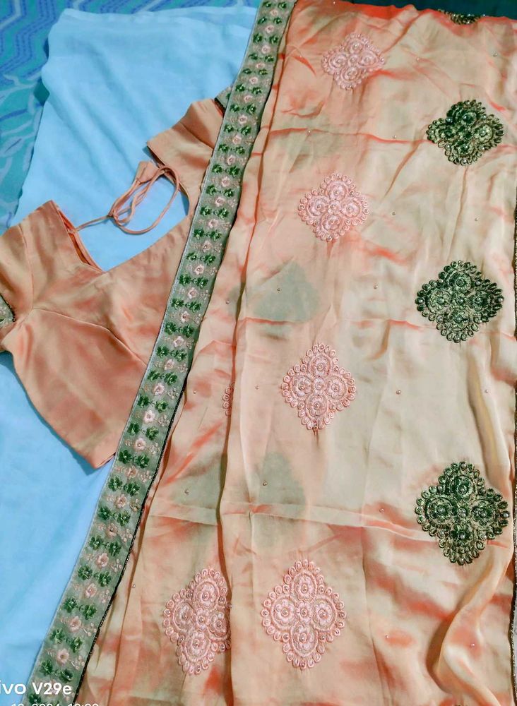 Women Orange Embroidery Saree🧡