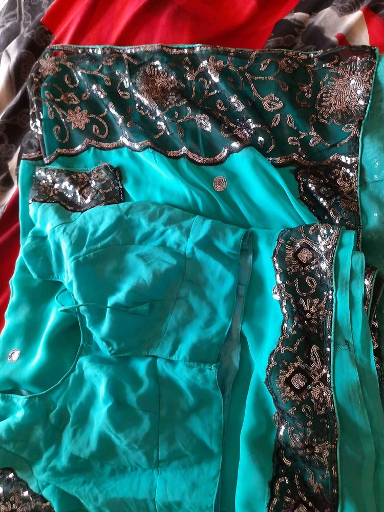 Sky Blue Heavy Net Work Saree With Blouse