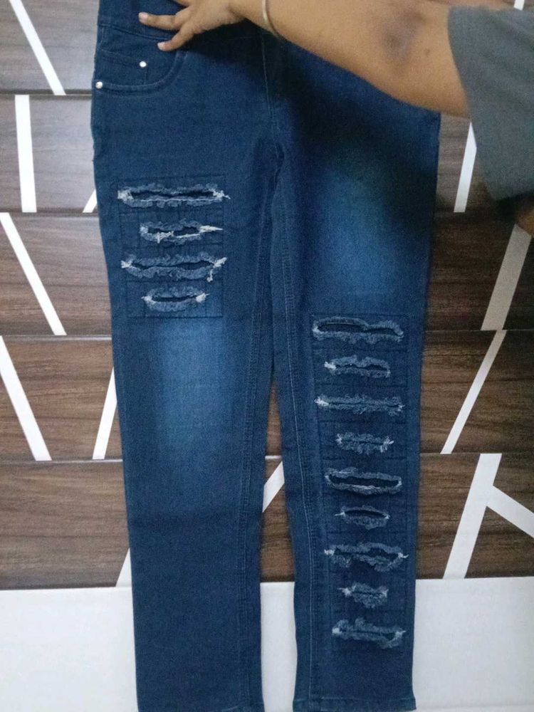 Ripped Dark Blue Jeans