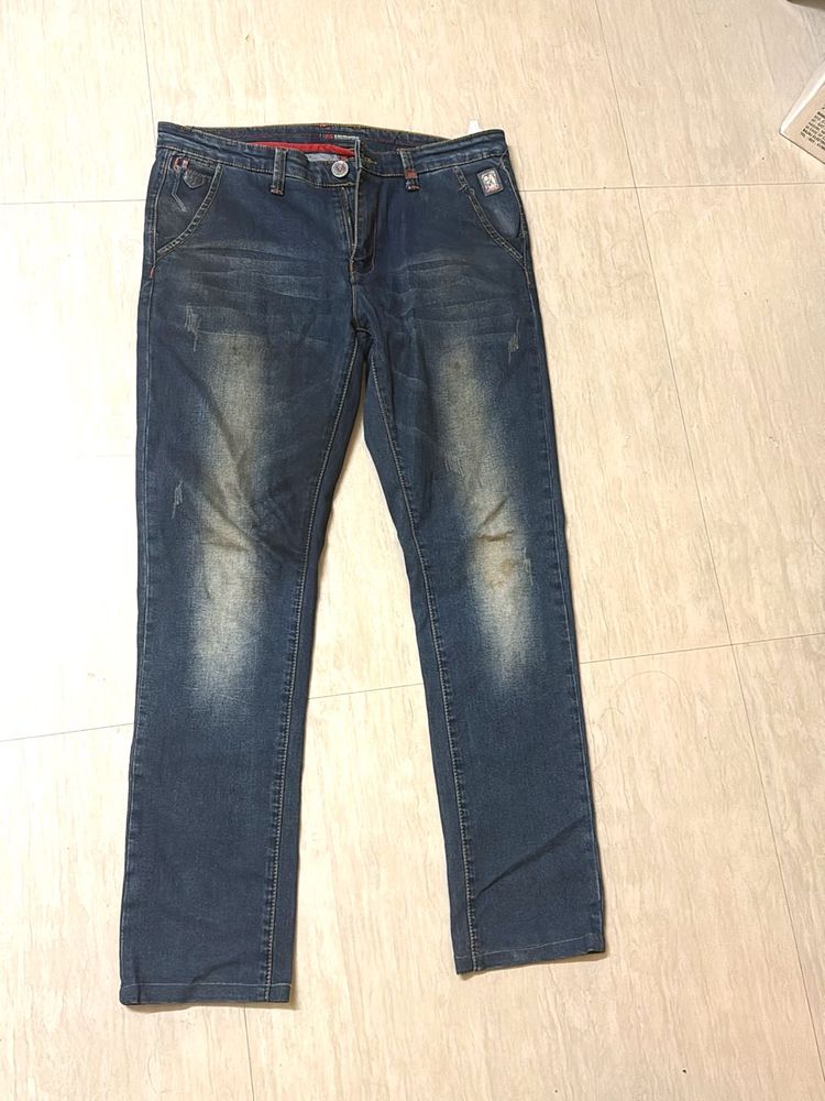Distressed Denim Jeans