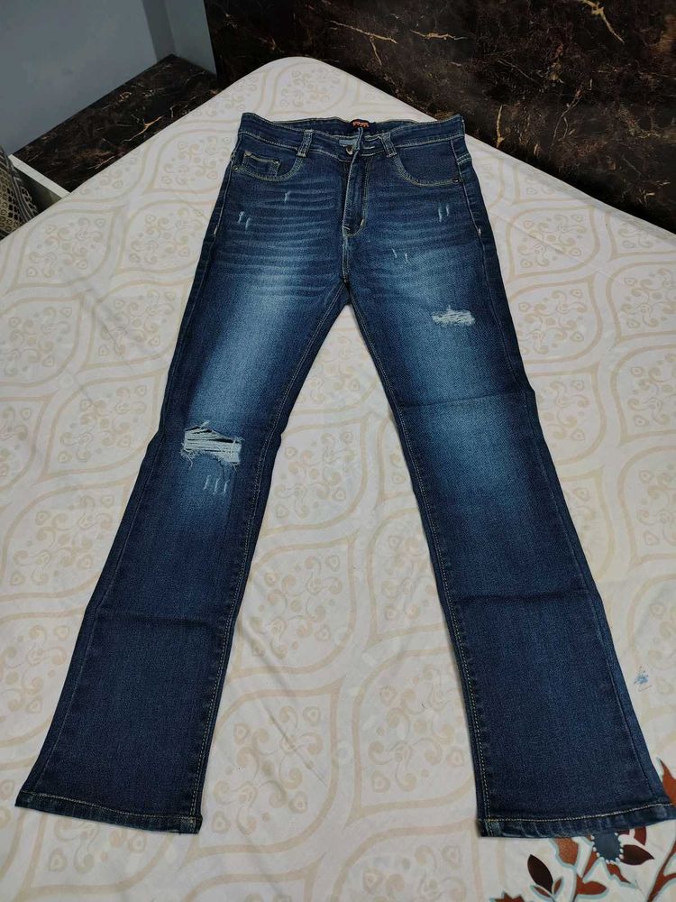 Distressed Denim Jeans
