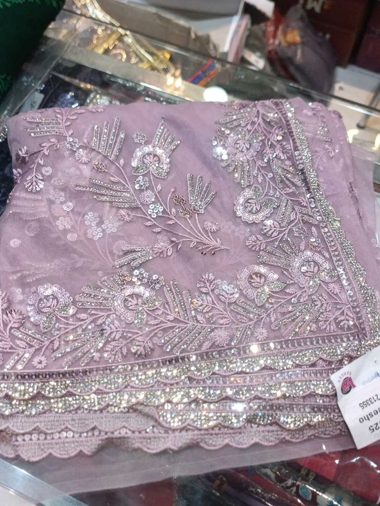 Embroidered Lavender Net Saree (Issue)