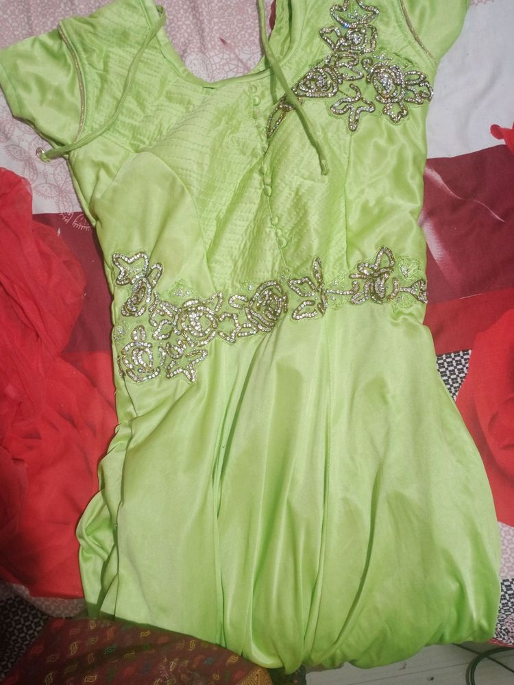 combo of parrot green  gown and ready made saree