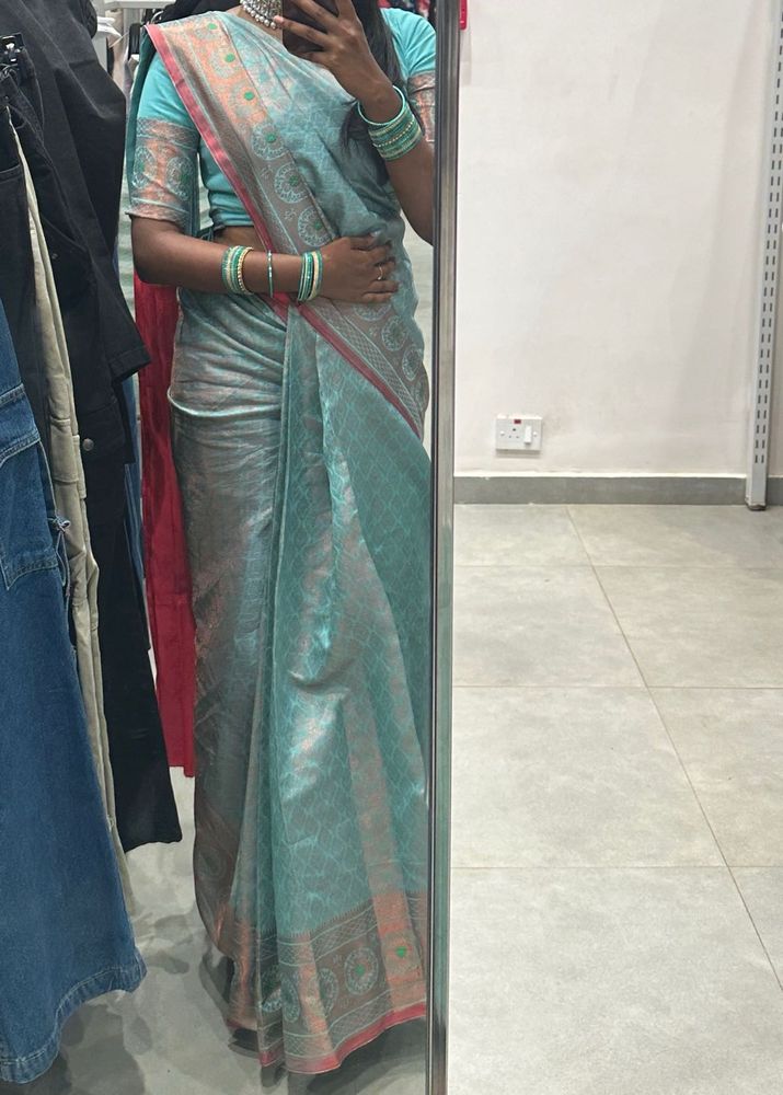 Aqua Blue Saree With Pink Little