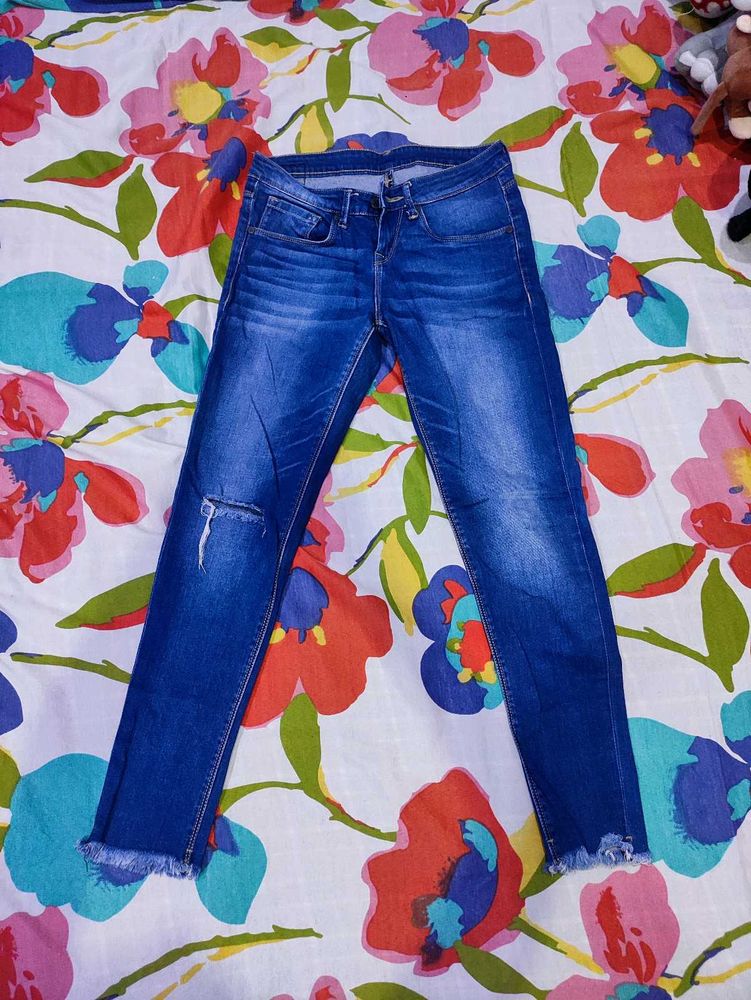 Ripped Knee Denim Jeans