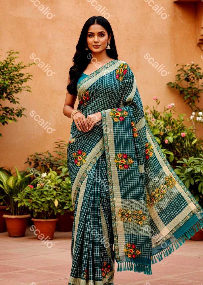 Elegant Teal Embroidered Saree