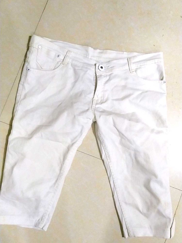 A White Knee Length Jeans