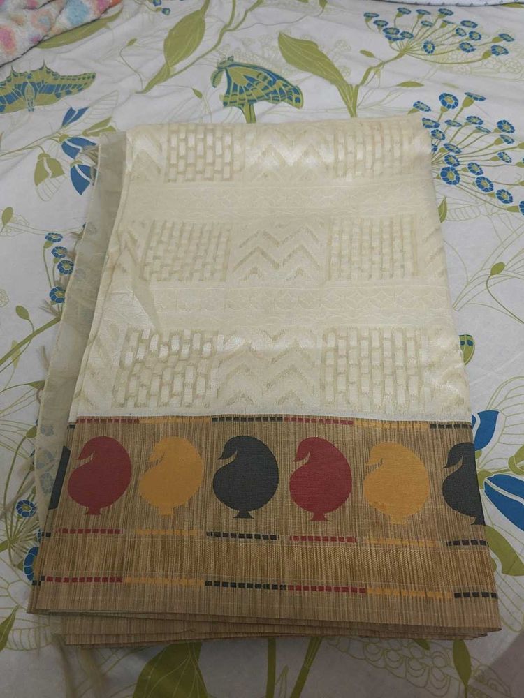 Elegant Off-White Saree with Paisley Border