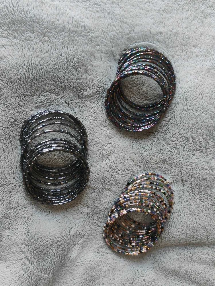 Set Of 3 Spring Type Plastic Bangles