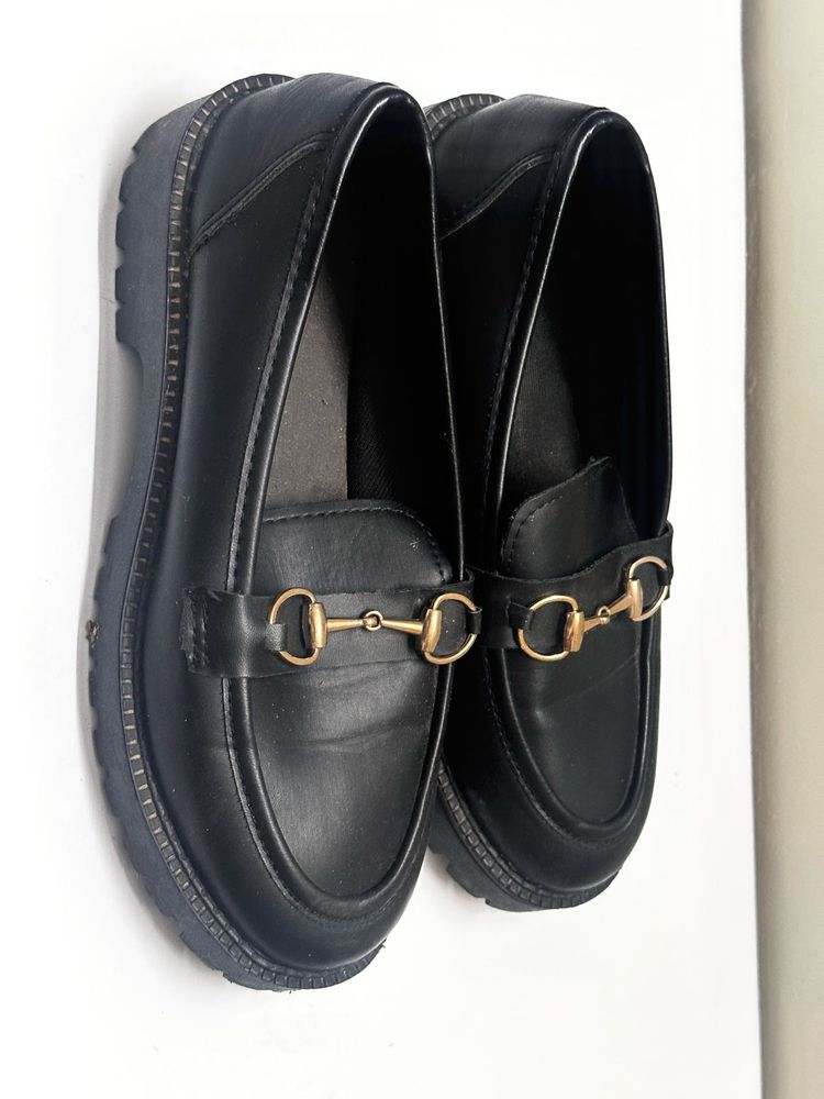 Black Loafers with Gold Detail