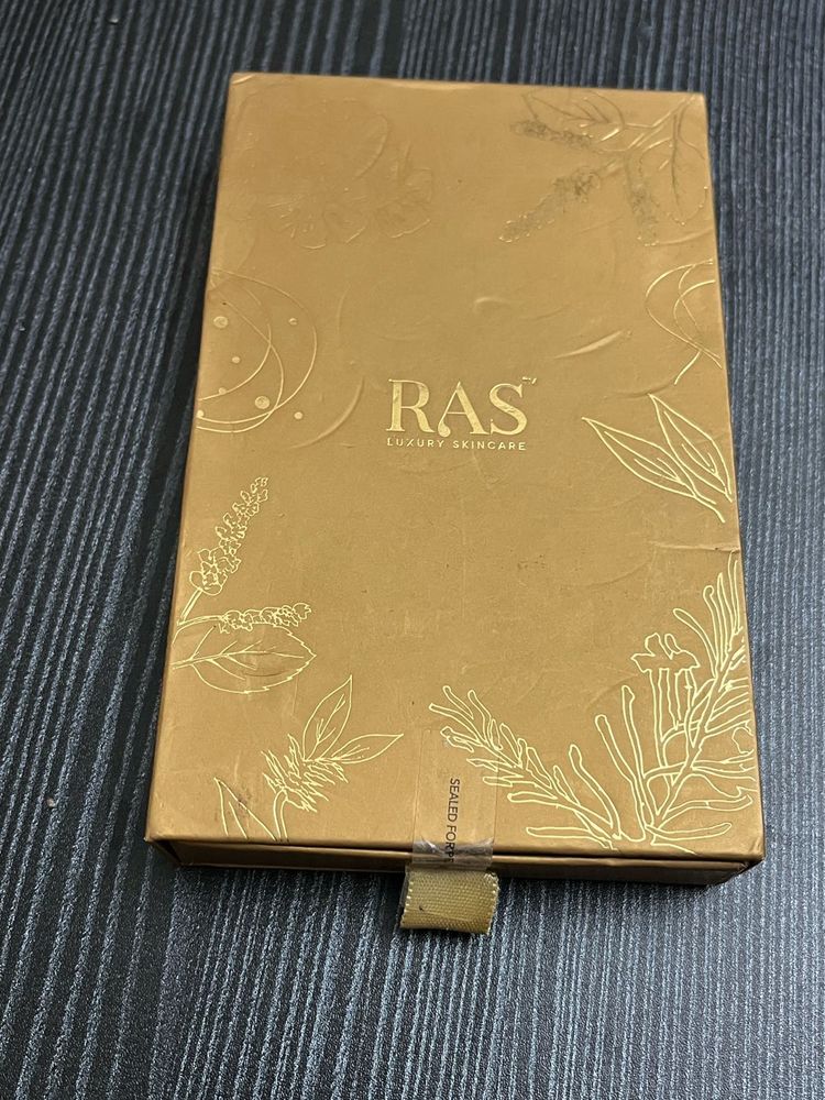 RAS Luxury Skincare Box lip gloss miniature