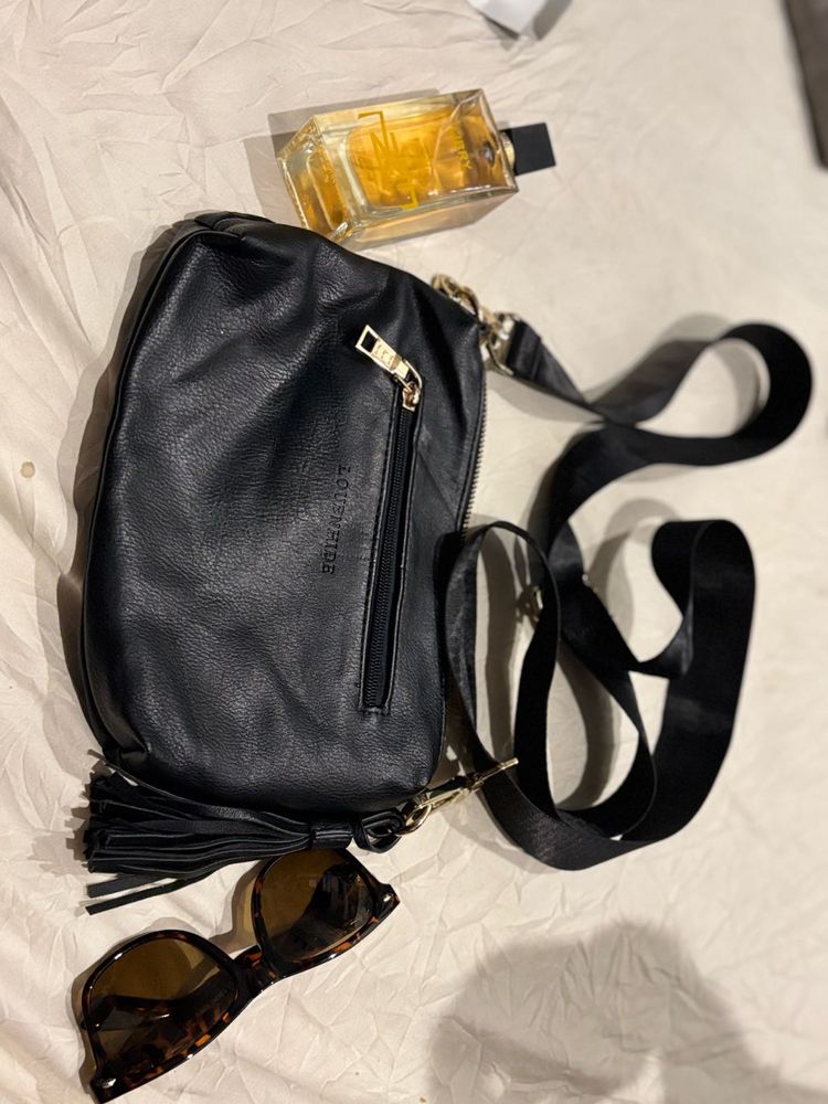 louenhide authentic sling bag