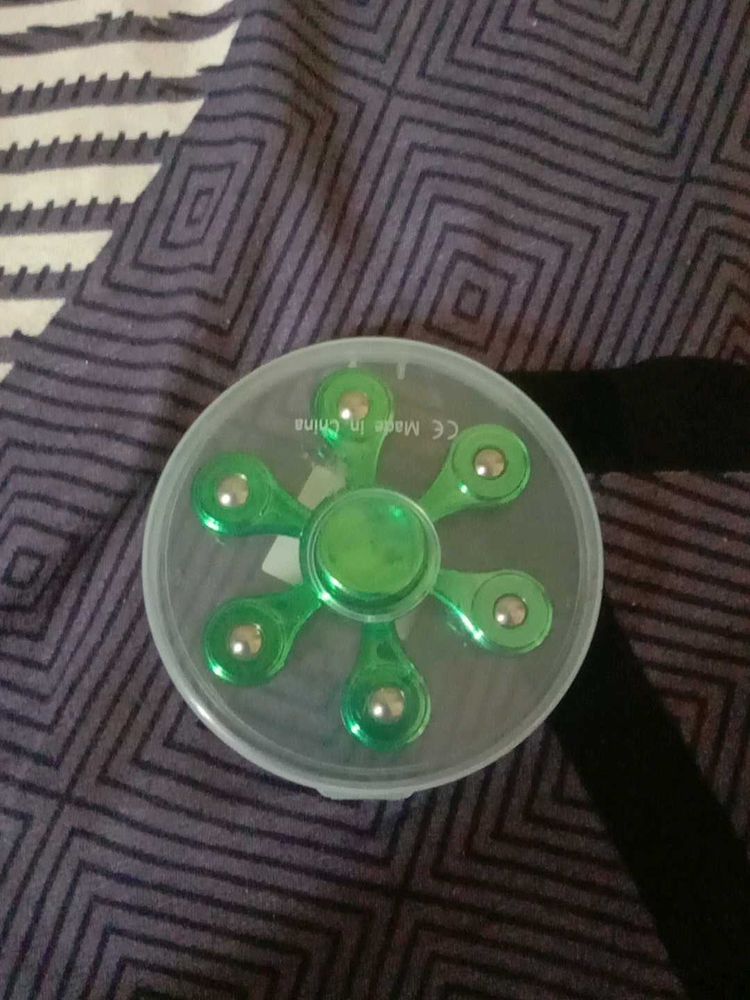 Green Fidget Spinner , per spin duration= 1min+