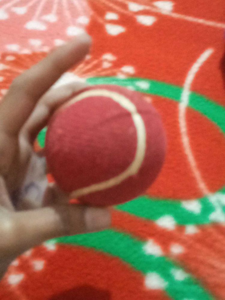 A laser red ball with box