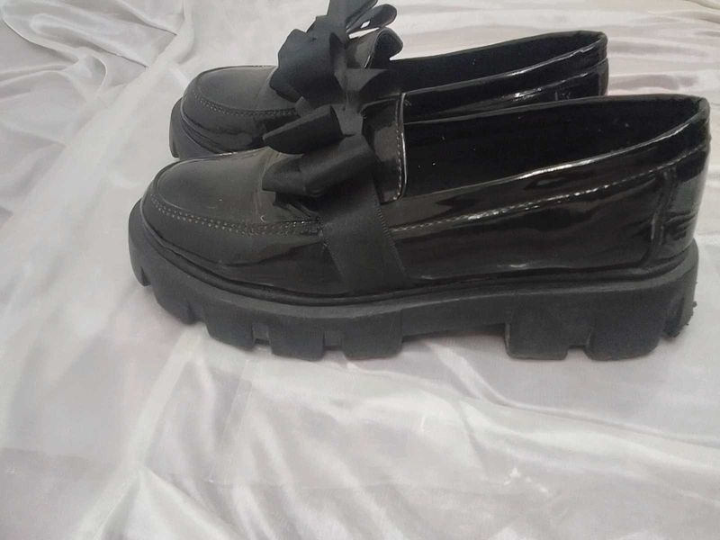 Black Loafers with Bow Detail