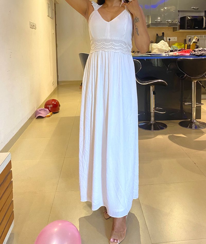 Long White Gown With A Beautiful Back Neck.