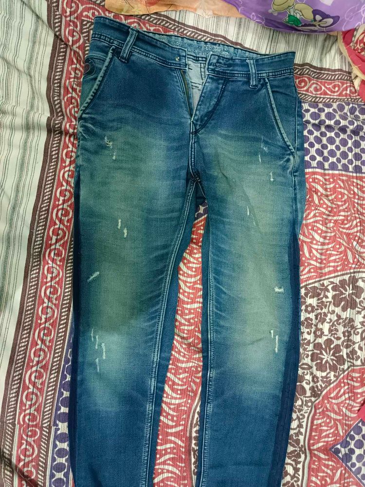 Distressed Blue Jeans