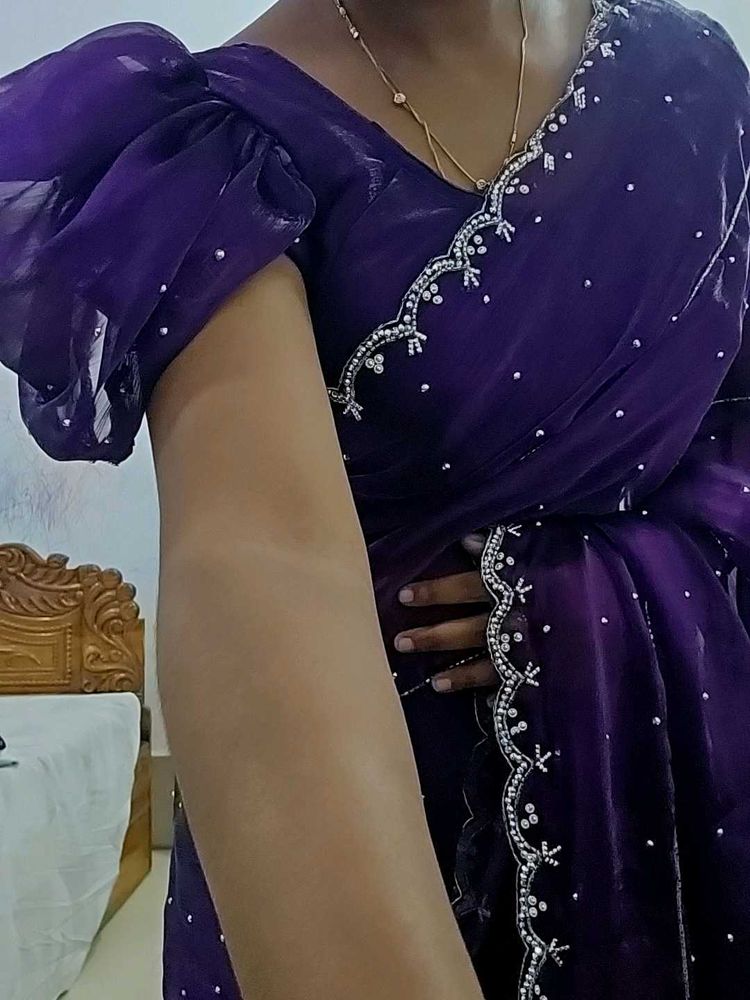 Elegant Purple Saree with Embellishments
