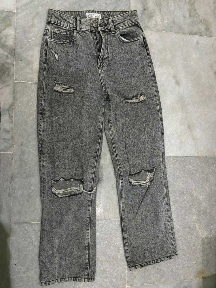 Straight legged ripped jeans