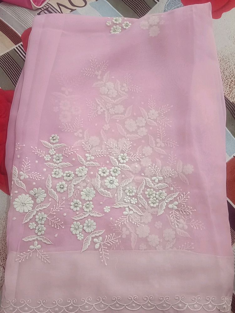 A Pink Saree With Beautiful Design
