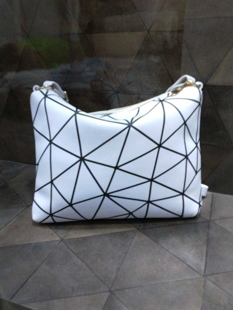 White Sling Bag.
