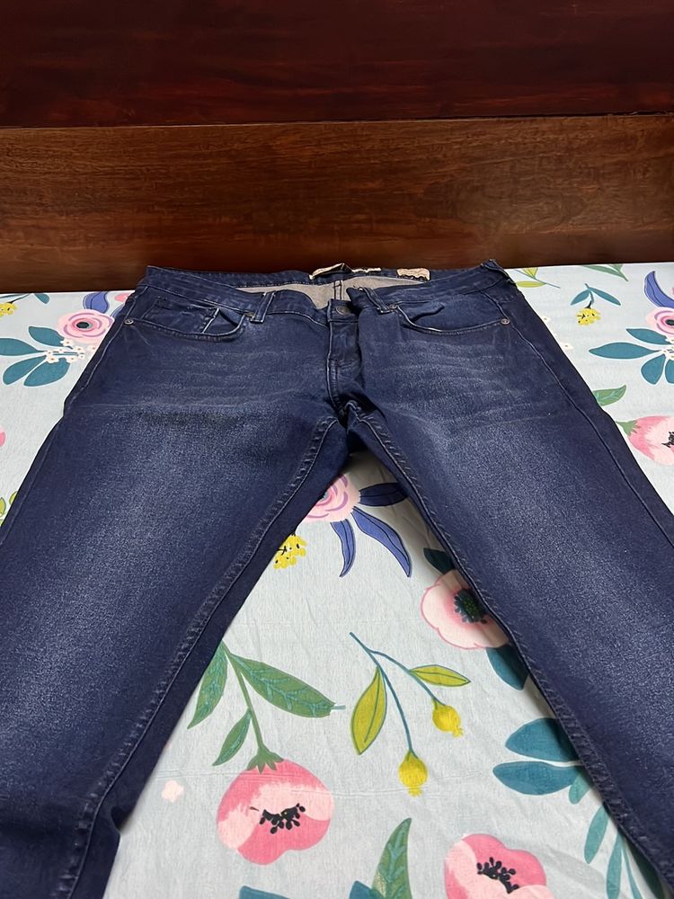 Bare denim Dark blue jeans