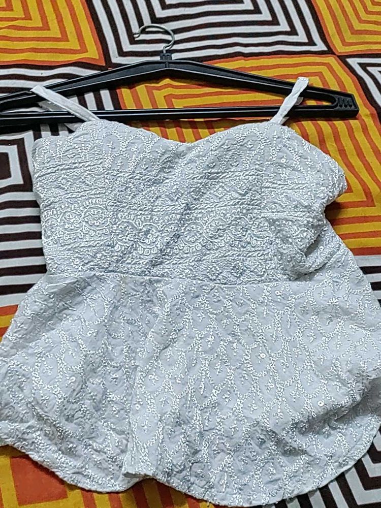 White Embroidered Peplum Top With Padded And Adjus