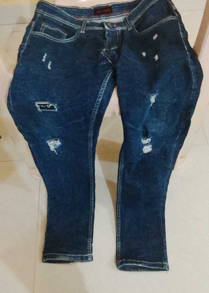 Distressed Denim Jeans
