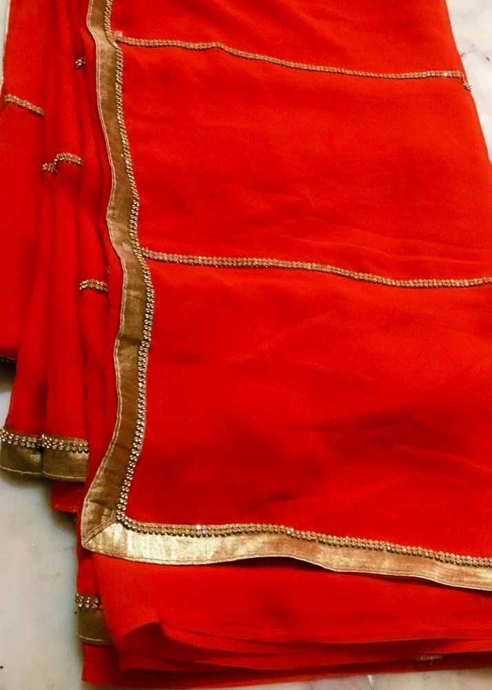 Orange Saree with Gold Dimond Patti Border