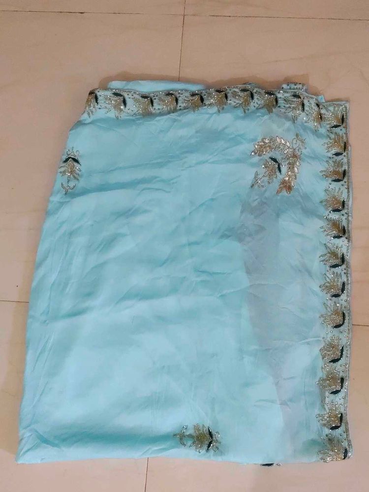 Cinon Fabric Cyan Colour Saree Without Blouse