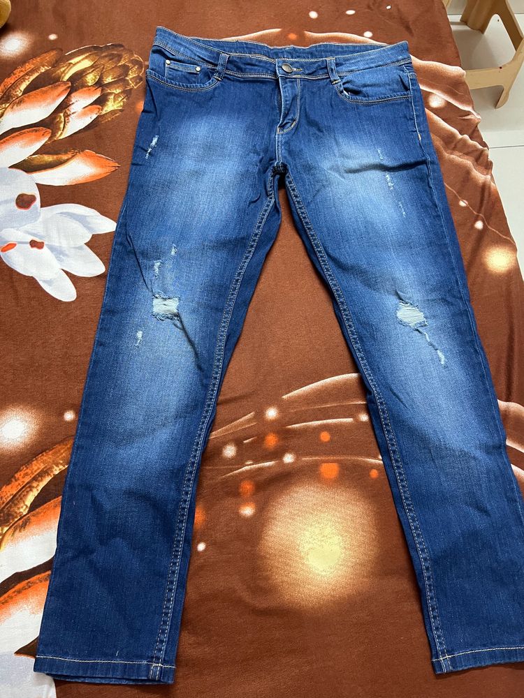 Blue Distressed Denim Jeans