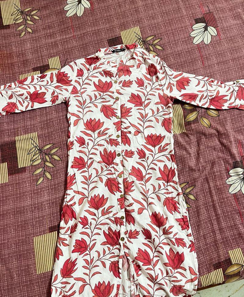 White Kurti with pink coloured Lotus on it