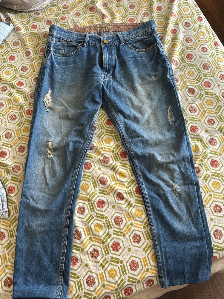Distressed Denim Jeans