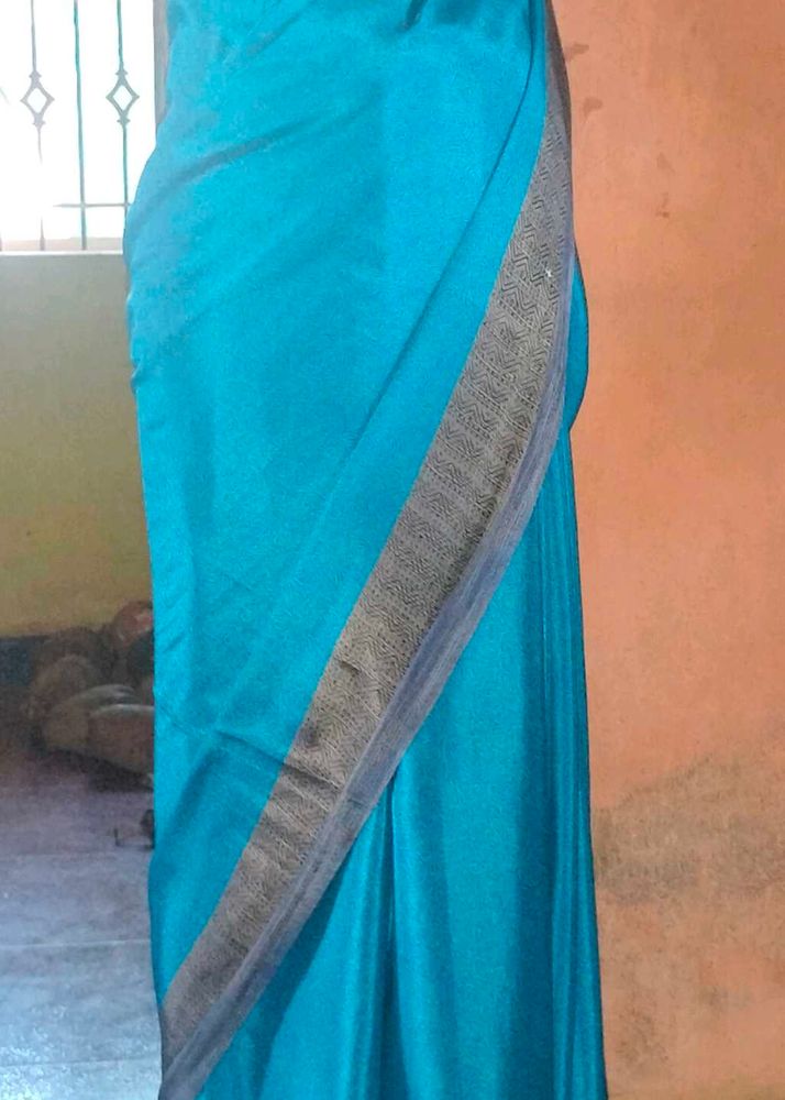 Teal Saree with Silver Border