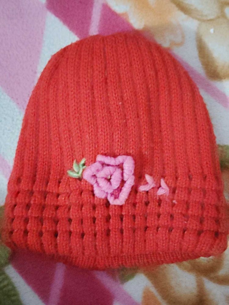 Adorable Knitted Beanie with Floral Detail