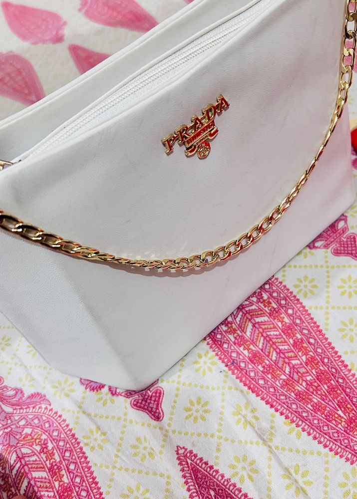Sling white color bag...with chain