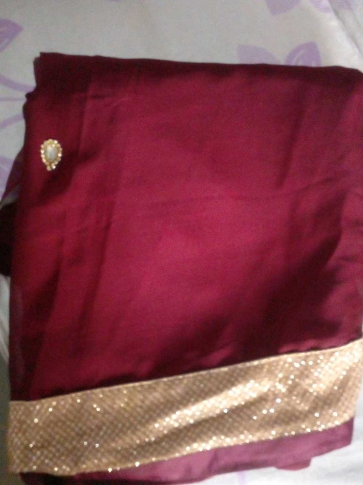 Elegant Maroon Saree with Gold Border