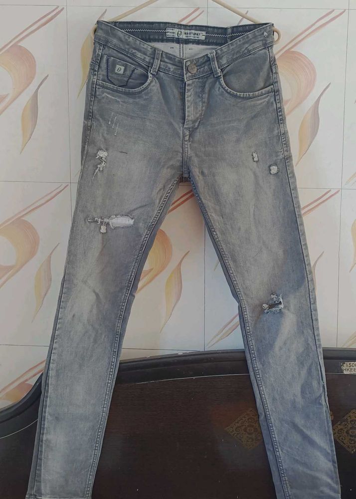 Distressed Gray Denim Jeans