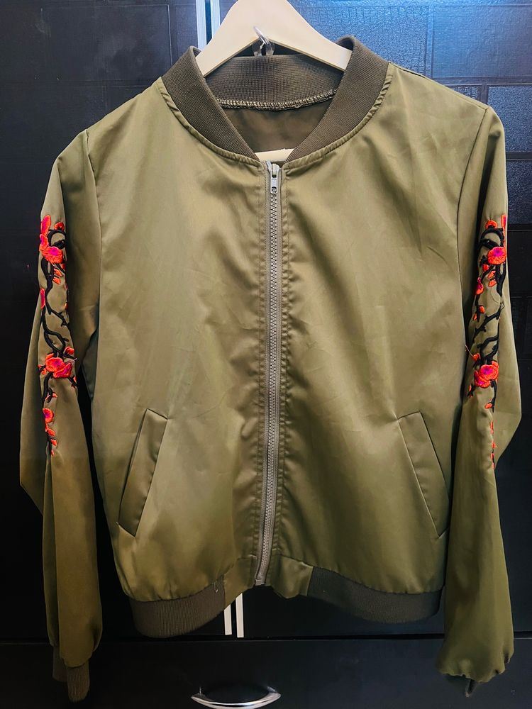 Olive Green jacket.