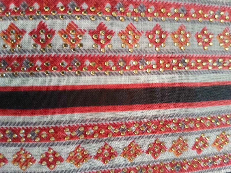Striped Textile with Embellishments