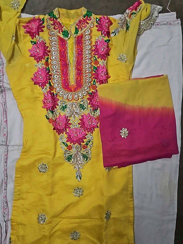 Yellow Kurti With Pink Embroidery