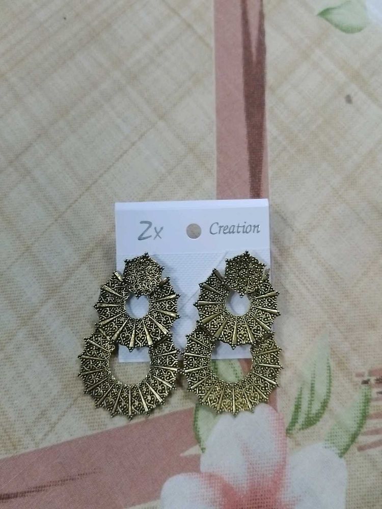 Golden colored Earrings