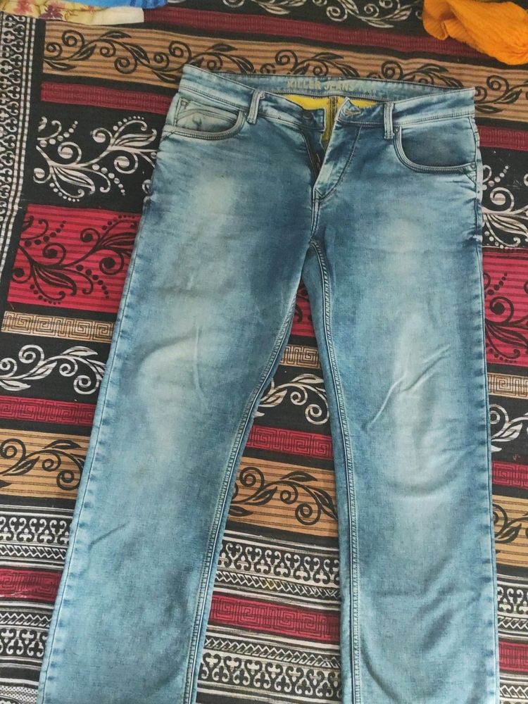 Stylish blue faded Killer jeans in good condition!