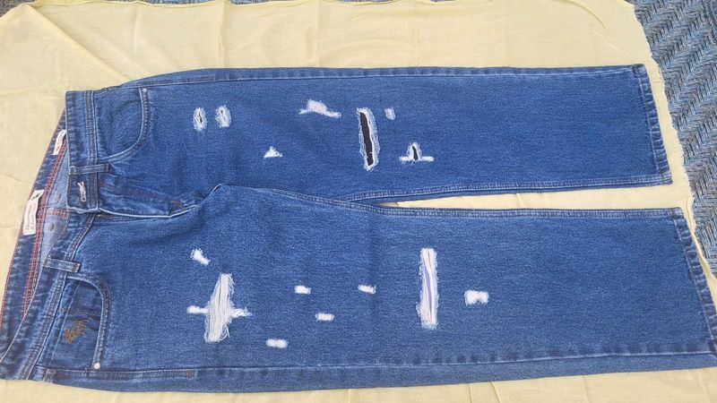 Distressed Denim Jeans