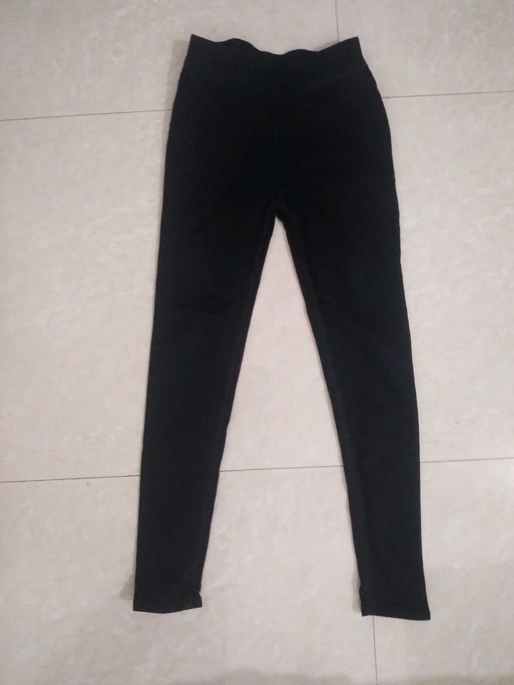 Black denim jeggings.