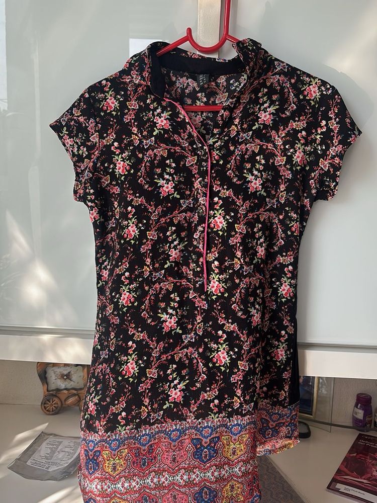 Floral Print Top bust is 18 inches