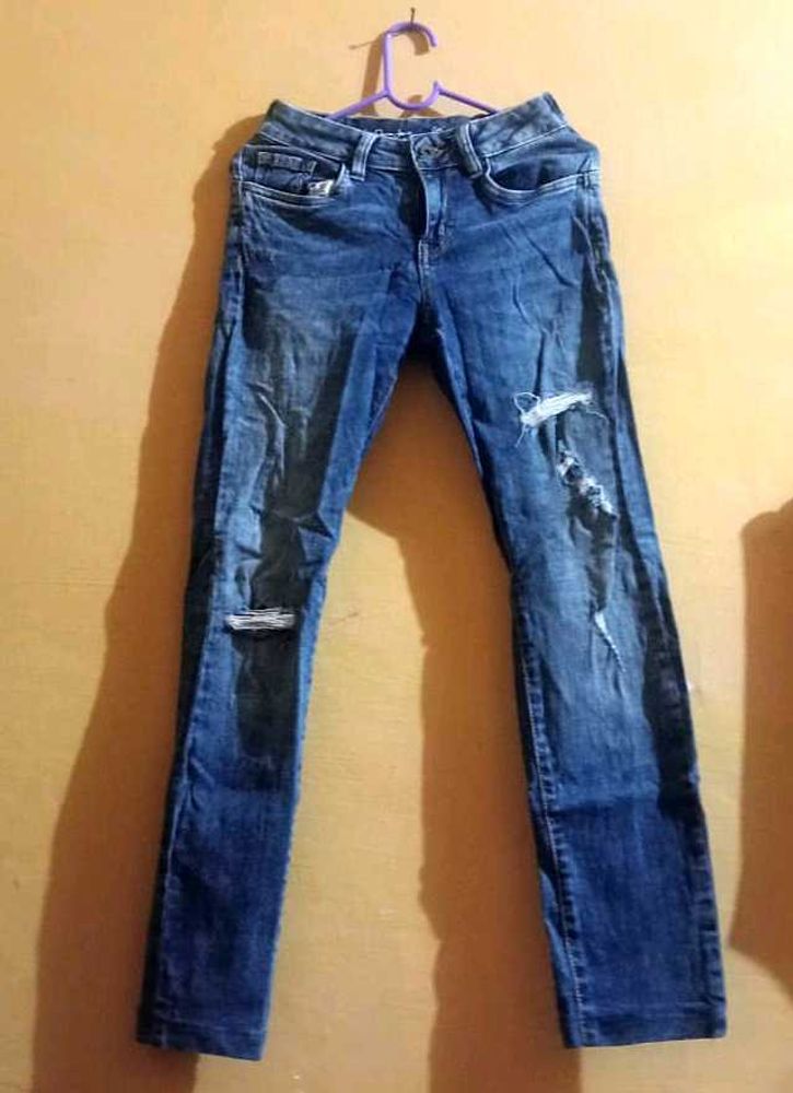 Ripped Blue Denim Jeans