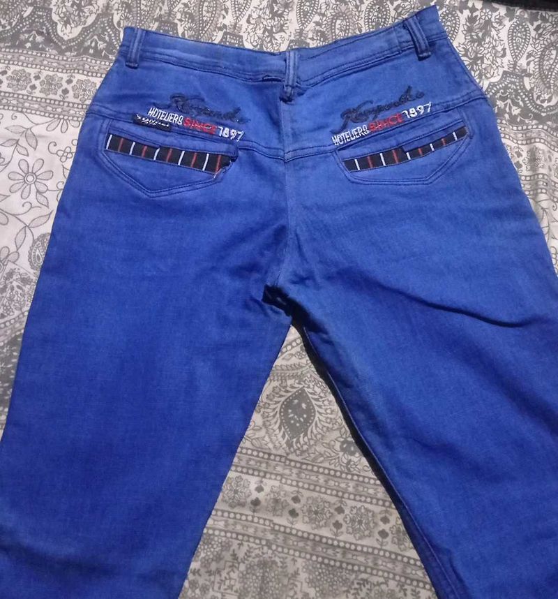 Unique Blue Jeans with Striped Pocket Detail