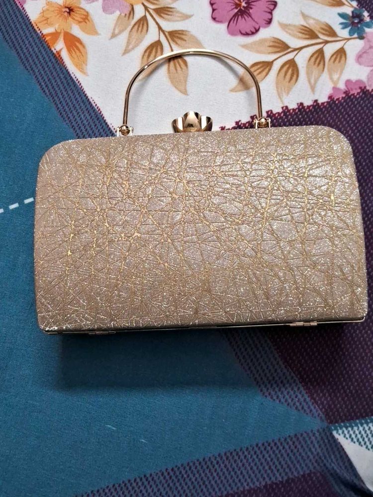 Beautiful Golden Party wear Clutch